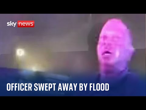 Florida: Bodycam shows officer and motorist swept through drainage pipe during flood