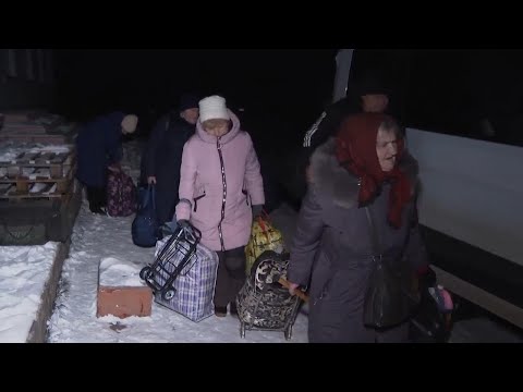 People flee life in Russian-controlled areas of Ukraine through dangerous corridor on front line