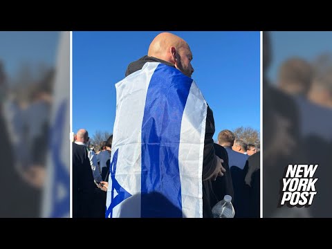 Fetterman drapes himself in Israeli flag during DC rally in support of the Jewish state