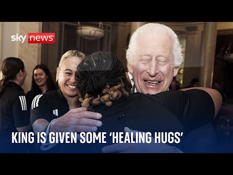 'A hug? Why not!': King Charles swarmed by New Zealand women's rugby team