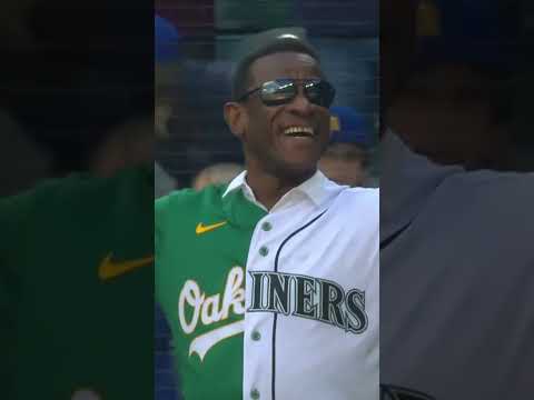 Hall of Famer Rickey Henderson throws out the first pitch before todays As-Mariners game