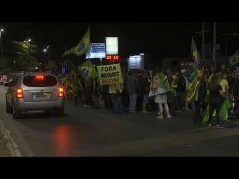 Supporters of Brazil’s ex-president Bolsonaro rally outside his home amid legal turmoil | AFP