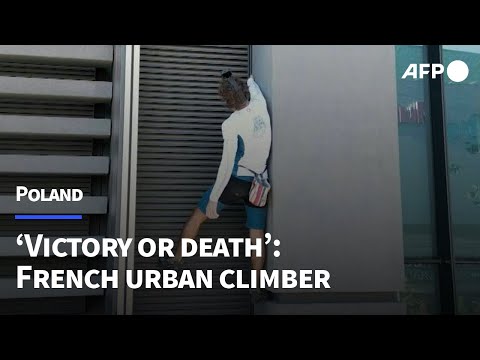 ‘Victory or death’: Titouan Leduc climbs the EU's tallest tower in Warsaw | AFP