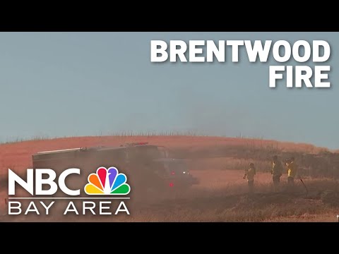 East Bay fire threatens homes