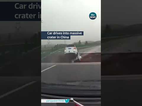 Dashcam footage shows a car driving off a collapsed bridge #china after torrential rains #itvnews