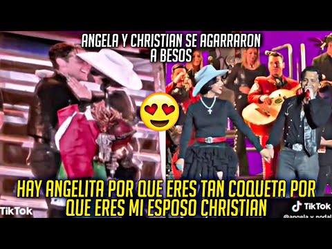 ANGELA AGARRA A BESOS A SU ESPOSO CHRISTIAN HOY EN EL CONCIERTO DE LOS ANGELES CALIFORNIA