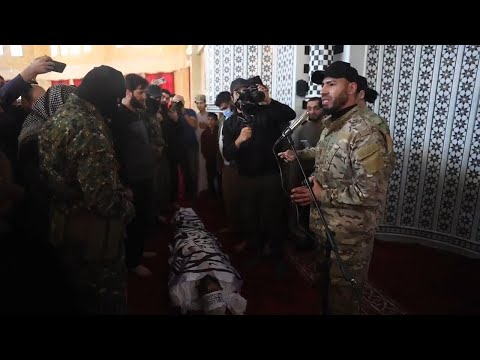 Funeral of co-founder of Syria's main al-Qaida-linked group