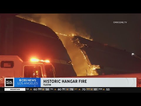 As flames finally die down, Tustin residents react to devastating fire at historic WWII era hangar