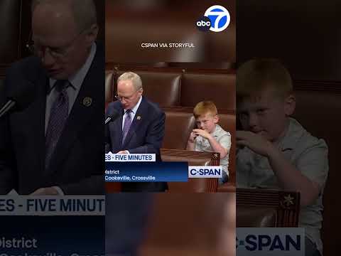 Congressman's son pulls silly faces during dad's speech on House floor