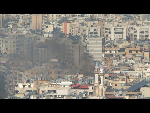 Smoke rises over the southern suburbs of Beirut after further blasts