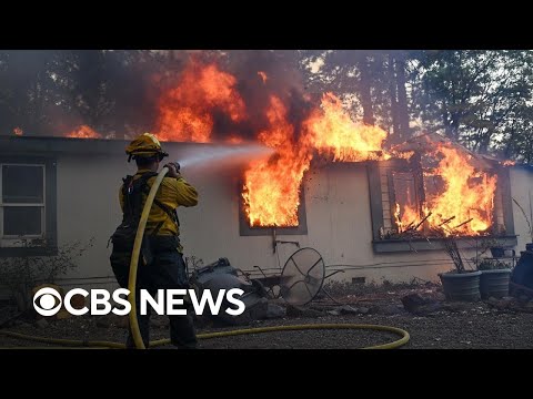 Massive fires burn parts of the West