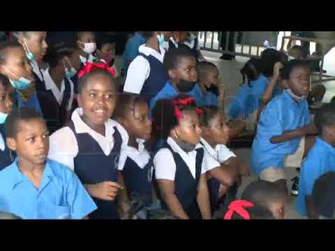 Officers of the mounted branch and canine unit visited the Rose Hill Rc School In Laventille