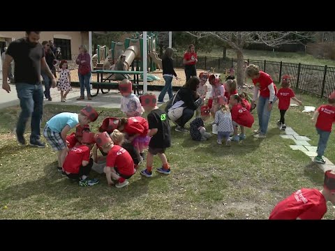 Aurora students release ladybugs as part of Earth Day festivities