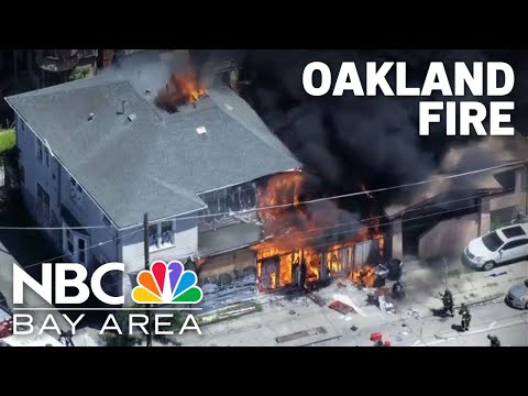 Watch: Firefighters battle structure fire in Oakland