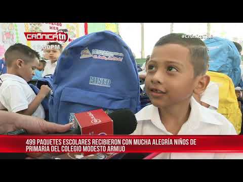 Niños de primaria reciben con alegría paquetes escolares en Managua - Nicaragua