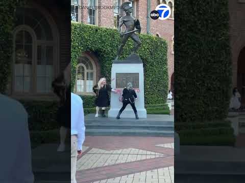 Protester spray-paints “Say no to genocide” on Tommy Trojan statue at USC