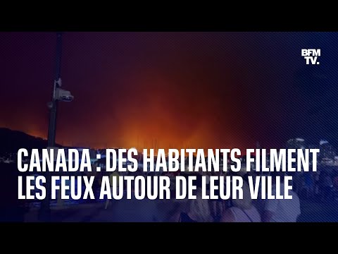 Incendies au Canada: les habitants de Kelowna filment les feux aux portes de leur ville
