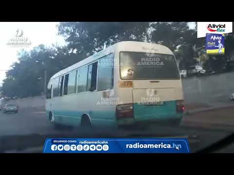 Buses rapiditos peleando línea en Tegucigalpa, Honduras