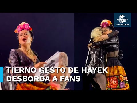 Hayek tiene amoroso gesto con fan durante concierto de Madonna