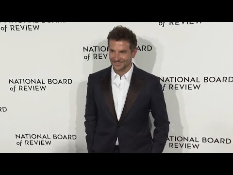 Paul Giamatti, Bradley Cooper and Lily Gladstone pose at National Board of Review gala