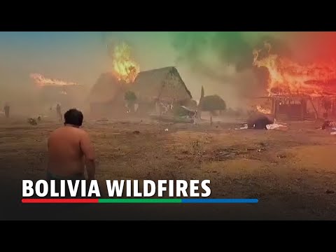 WATCH: Man tries to save belongings from burning home in Bolivia