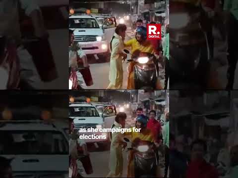 BJP Candidate From Amethi Smriti Irani Rides A Scooter As She Campaigns For Elections 2024