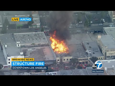 Commercial building fire in DTLA sends plume of black smoke into air