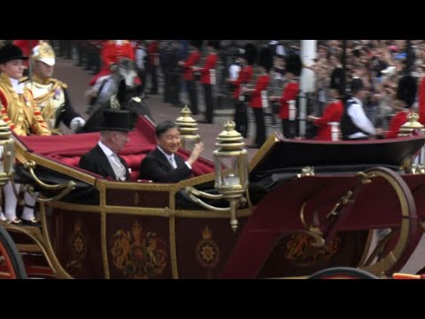 Un cortège de calèches conduit l'empereur du Japon au palais de Buckingham | AFP Images