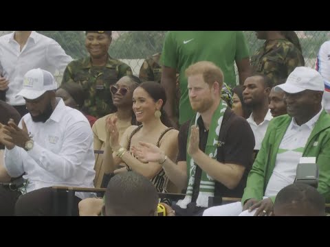 Harry and Meghan charm the crowds by participating in a volleyball match