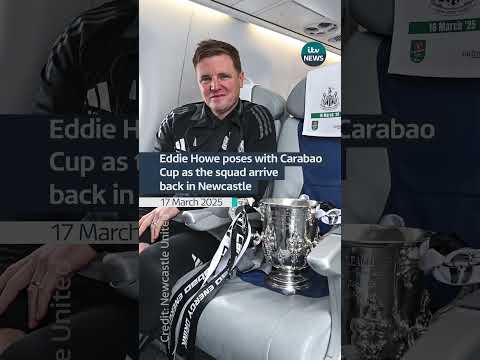 Eddie Howe poses with the Carabao Cup as the squad arrive back in Newcastle | ITV News
