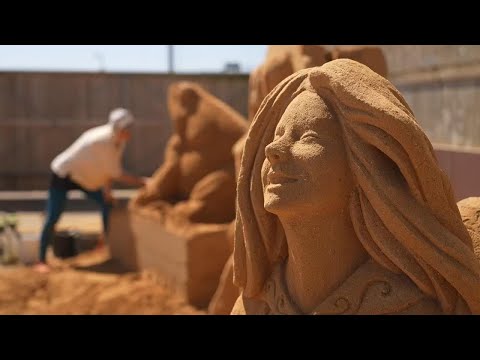 ‘Faith and superstition’ themed sand sculptures emerge from shores at Danish seaside festival