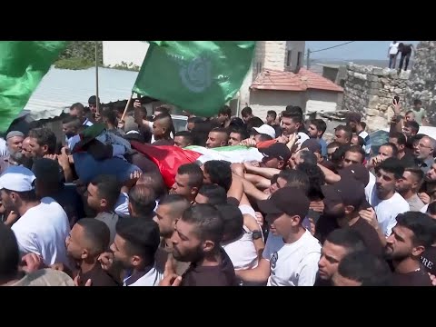 Funeral of Palestinian teacher who was killed when Israeli military raided West Bank town