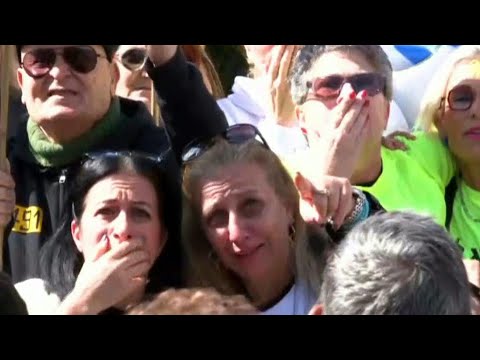 Israelis in Tel Aviv cheer as three hostages released in fifth exchange | AFP