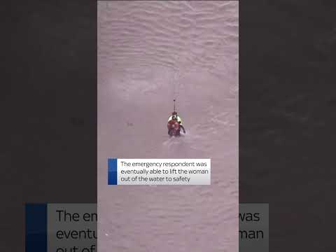 Dramatic video shows woman rescued by helicopter from LA river