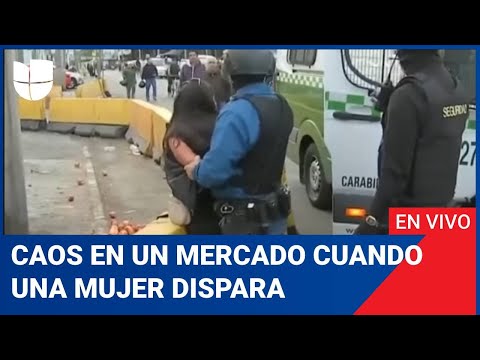 Edicion Digital: caos en un mercado cuando una mujer dispara contra el guardia que la detiene