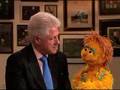 President Clinton and Muppet Kami share HIV/AIDS message