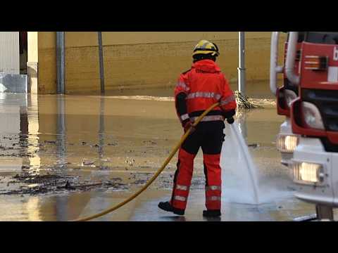 Torrential rains flood Valencia and Catalonia, killing driver in Spain