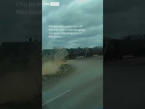 Moment train ploughs into truck
