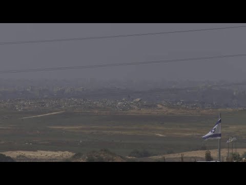 Smoke rises from Israel-Gaza border area patrolled by Israeli troops