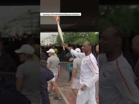 Watch Snoop Dogg carry Olympic torch on final leg of journey to Paris Olympics #shorts