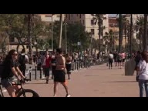 Barcelona beach cleared as opening time ends