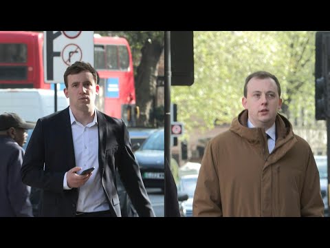 Two British men accused of spying for China arrive at court | AFP