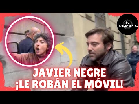 SIMPATIZANTE DEL PSOE ROBA EL MÓVIL A JAVIER NEGRE EN LA CALLE FERRAZ