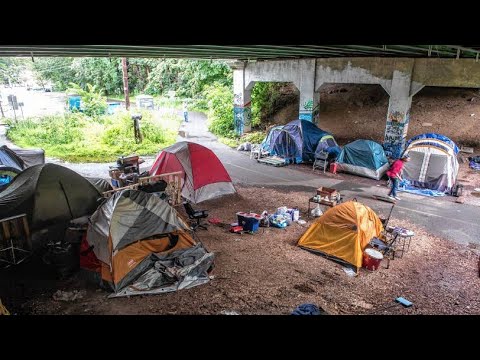 Tuddle Interviews Someone At A Homeless Camp