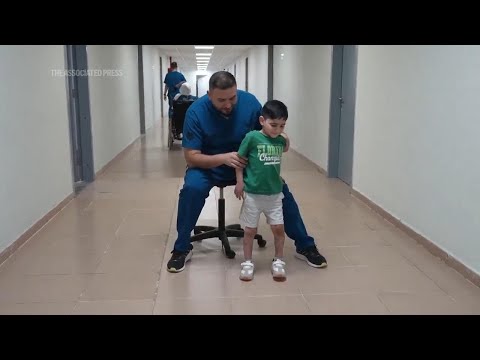 Palestinian children injured in Gaza war and their families try to adapt to life in UAE
