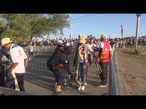 Thousands in East Timor walk long distances to see Pope Francis' huge open-air Mass