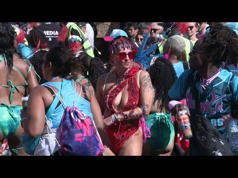 Londoners attend the annual Notting Hill Carnival | AFP