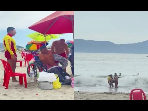 Chimbote: Hombre con discapacidad disfruta de un chapuzón en el mar con ayuda de salvavidas