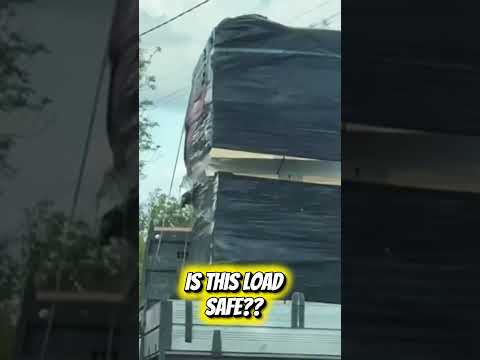 This load was spotted on the road and filmed by the passenger.  Is this a secure load??