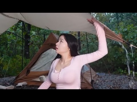 Camping alone in the mountain on a rainy night